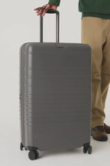 The Large Check-In Roller in Charcoal