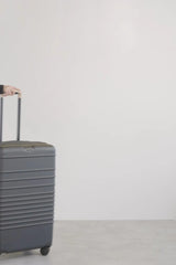 The Medium Check-In Roller in Black