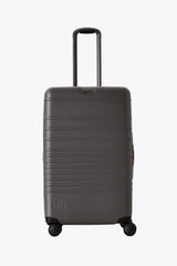 The Medium Check-In Roller in Charcoal