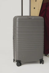 The Medium Check-In Roller in Charcoal